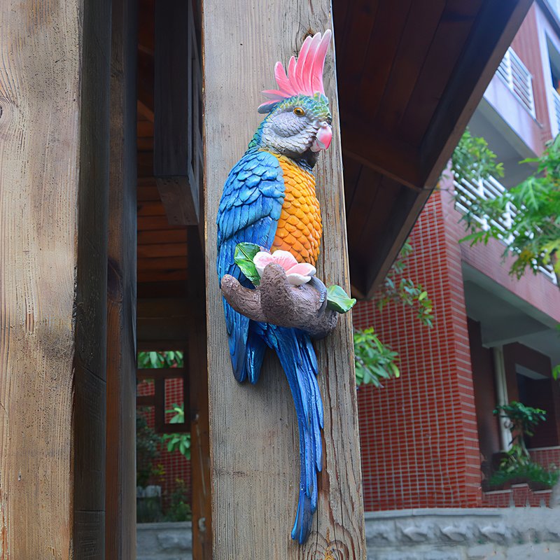 Statue de jardin perroquet bleu-jaune murale
