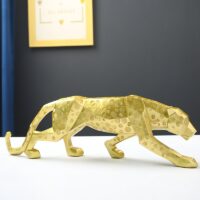 Statue panthère dorée en résine tacheté