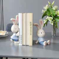 Statue serre livre lapin mignon bleu