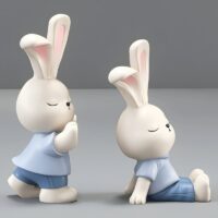 Statue serre livre lapin mignon bleu