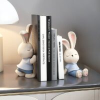 Statue serre livre lapin mignon bleu